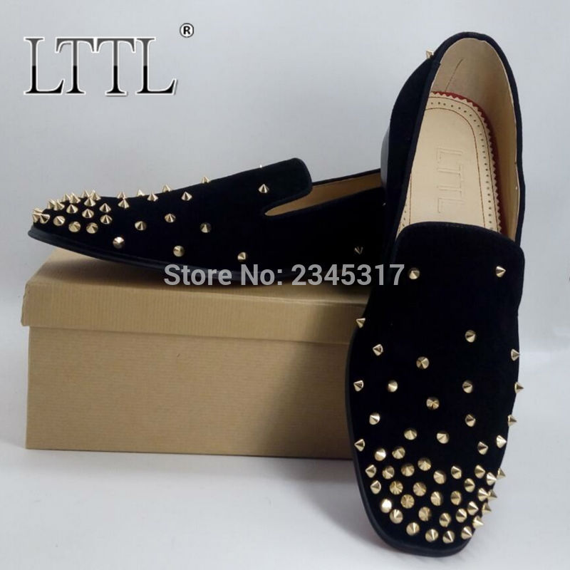 black loafers with gold spikes